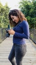 Outdoor summer smiling lifestyle portrait of pretty young woman having fun in the city of Lima taking pictures Royalty Free Stock Photo