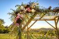 Jewish traditions wedding ceremony. Wedding canopy chuppah or huppah close up on the flowers