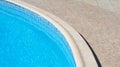 Outdoor swimming pool with stone curve border