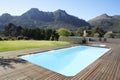 Outdoor Swimming Pool Surrounded With Wooden Decking