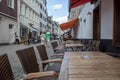 Outdoor table and chair without people in front of cafe, bar, and restaurant in walking street old town DÃÂ¼sseldorf, Germany. Royalty Free Stock Photo