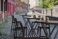 Outdoor table and chair without people in front of cafe, bar, and restaurant in walking street old town DÃÂ¼sseldorf, Germany. Royalty Free Stock Photo