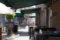 Outdoor table and chair without people in front of cafe, bar, and restaurant in walking street old town DÃÂ¼sseldorf, Germany. Royalty Free Stock Photo