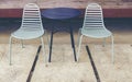 Outdoor table and chairs in bistro cafÃÂ© in daytime in nature for relaxation, travel, season, time, holiday Royalty Free Stock Photo