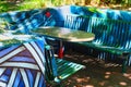 Outdoor Table and Chairs in Colourful Enclosure Royalty Free Stock Photo