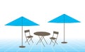 Outdoor table, chairs and umbrellas