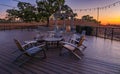 Outdoor table with chairs on a wooden deck in the spring in Napa Valley, California USA Royalty Free Stock Photo