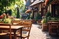 Outdoor table of coffee cafe and restaurant. Summer terrace on city street. Empty outside tables and chairs of outdoor cafe on Royalty Free Stock Photo