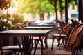 Outdoor table of coffee cafe and restaurant. Summer terrace on city street. Empty outside tables and chairs of outdoor cafe on Royalty Free Stock Photo