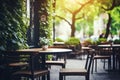 Outdoor table of coffee cafe and restaurant. Summer terrace on city street. Empty outside tables and chairs of outdoor cafe on Royalty Free Stock Photo