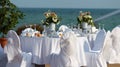 Outdoor Table Setting at Wedding Reception by the Sea