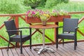 Outdoor terrace cafe table with two chairs Royalty Free Stock Photo