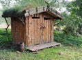 Outdoor toilet of wood in in the country