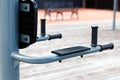 outdoor trainer push-ups on parallel bars