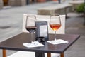 Outdoor two glass of wine on table outside the bar relaxing at holiday concept Royalty Free Stock Photo