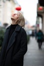 Outdoor urban female portrait. Fashion model. Young woman posing in Milan streets China town. Royalty Free Stock Photo