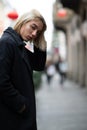 Outdoor urban female portrait. Fashion model. Young woman posing in Milan streets China town. Royalty Free Stock Photo