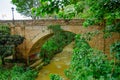 Outdoor view of brick bridge located inside the forest in colonial city Popayan