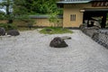 Outdoor view of the building and garden with dry rock in Kosenkaku Hotel, a traditional luxury hot spring hotel in Arima Onsen, Ja