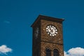 Outdoor view of a clocktower against blue sky Royalty Free Stock Photo