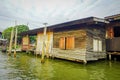 Outdoor view of gorgeous floating wooden house on the Chao Phraya river. Thailand, Bangkok Royalty Free Stock Photo
