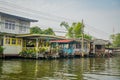 Outdoor view of old and rustic wooden houses on the Chao Phraya river. Thailand, Bangkok Royalty Free Stock Photo