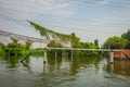 Outdoor view of pipeline with cable lines on the Chao Phraya river. Thailand, Bangkok Royalty Free Stock Photo