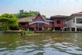 Outdoor view of red and white stoned house on the Chao Phraya river. Thailand, Bangkok Royalty Free Stock Photo