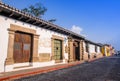 Outdoor view of stoned street with some old building houses and the historic city Antigua is UNESCO World Heritage Site