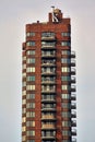 Outdoor view of a tall building against a cloudy sky Royalty Free Stock Photo