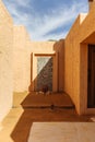 Outdoor villa sand-like wall with shadow at Abu Dhabi, UAE