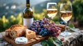 Outdoor vineyard picnic scene with wine and cheese. romantic getaway concept. fresh grapes and bread on rustic wooden