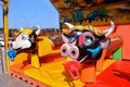 Outdoor vintage flying cow carousel