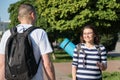 Outdoor walking man and woman, talking people middle-aged couple Royalty Free Stock Photo