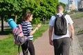 Outdoor walking man and woman, talking people middle-aged couple Royalty Free Stock Photo