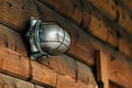 Outdoor wall light on lodging cottage wooden door