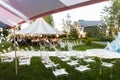 Outdoor wedding ceremony in the forest and wedding tents Royalty Free Stock Photo