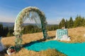 Outdoor wedding ceremony scene on a mountain slope Royalty Free Stock Photo