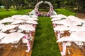 Outdoor wedding ceremony with umbrellas in the forest Royalty Free Stock Photo