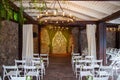 Outdoor wedding ceremony under a wooden canopy Royalty Free Stock Photo