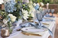 Wedding table set up in pastel blue, gold and white Royalty Free Stock Photo