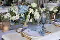 Wedding table set up in pastel blue, gold and white Royalty Free Stock Photo