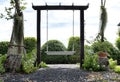 Outdoor white swing in backyard Royalty Free Stock Photo