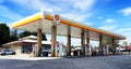 A Shell Gas Station with logo and blue sky background with copyspace