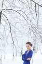 Outdoor winter portrait of young attractive woman