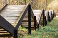 Outdoor wooden staircase without railing going down on hill Royalty Free Stock Photo