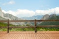 Outdoor wooden terrace revealing picturesque view on mountains Royalty Free Stock Photo