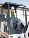 Worker machine driver man in construction site