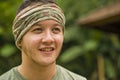 Young attractive and happy hipster man enjoying tropical nature exploring exotic Asian tourist destination during holiday trip Royalty Free Stock Photo