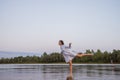 Outdoors fashion photo of beautiful bohemian lady at river.